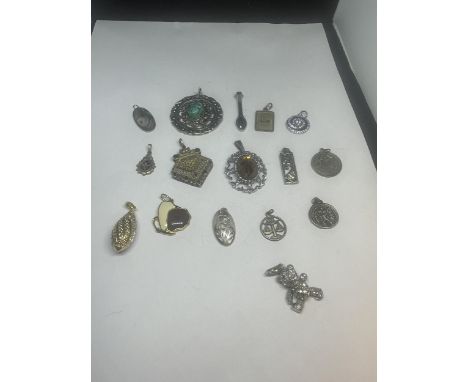 SIXTEEN VARIOUS VINTAGE PENDANTS 