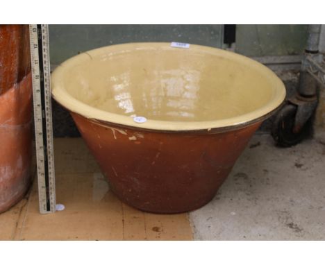 A GLAZED TERRACOTTA BOWL PLANTER 
