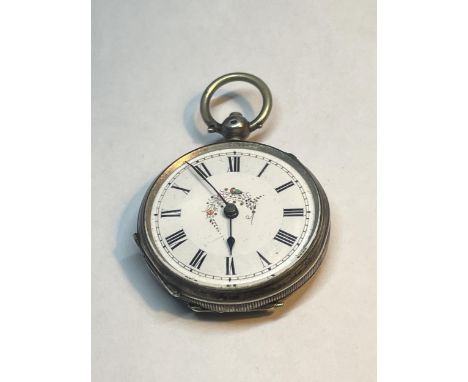 A MARKED 800 SILVER POCKET WATCH WITH WHITE ENAMEL DECORATIVE FACE AND ROMAN NUMERALS 