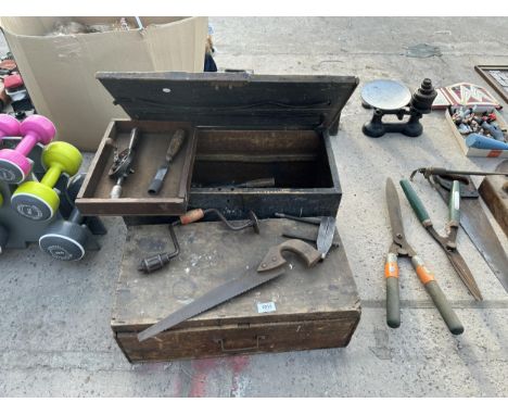 TWO VINTAGE WOODEN TOOL CHESTS WITH AN ASSORTMENT OF TOOLS TO INCLUDE CLAMPS, CHISELS AND BRACE DRILLS ETC 