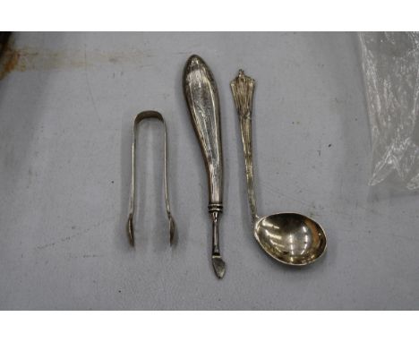 THREE MARKED SILVER ITEMS TO INCLUDE A GOLF CLUB SHAPED SPOON, SUGAR TONGS AND A MANICURE TOOL 