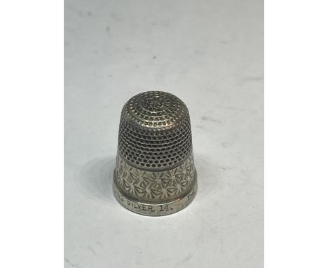 A MARKED STERLING SILVER THE SPA THIMBLE 