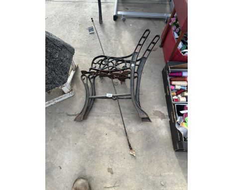 A PAIR OF DECORATIVE CAST BENCH ENDS 