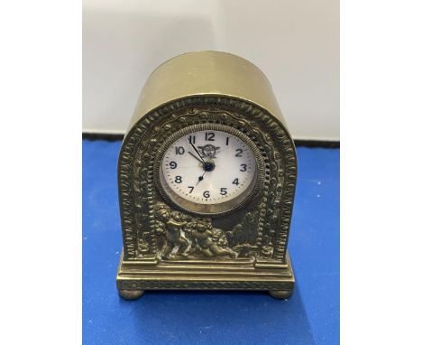 AN ITALIAN CLASSICAL BRASS MANTLE CLOCK WITH CHERUB DESIGN HEIGHT 12CM 