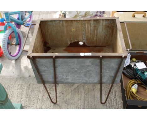 A METAL STORAGE BOX/TROUGH PLANTER WITH STAND 