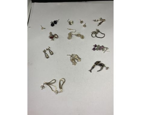 TWELVE PAIRS OF SILVER EARRINGS 
