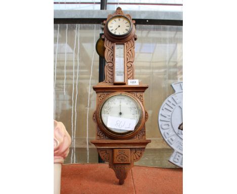 A VINTAGE OAK CASED WALL BAROMETER 