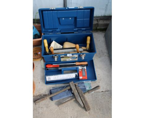 A PLASTIC TOOL BOX WITH AN ASSORTMENT OF TOOLS TO INCLUDE FILES AD A SHAVING PLANE ETC 