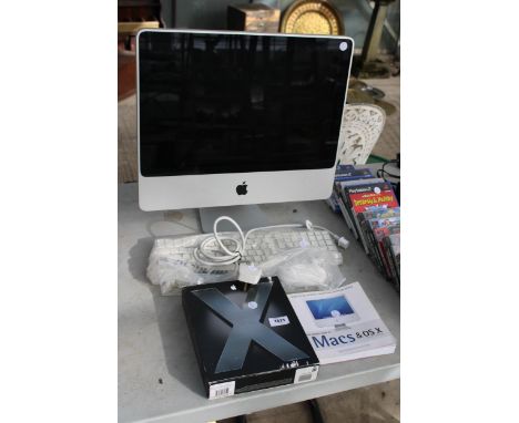 AN APPLE MAC COMPUTER, KEYBOARD, MOUSE AND MANUAL 