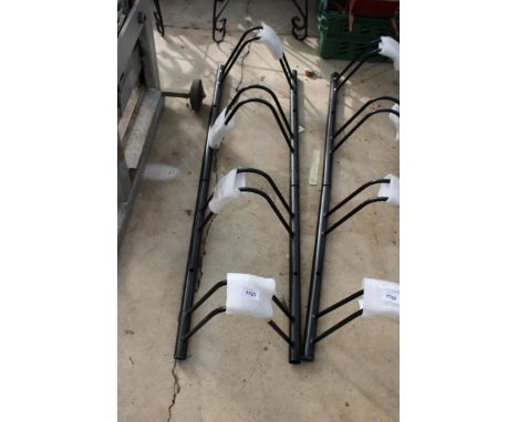 A FOUR SECTION METAL BIKE RACK 