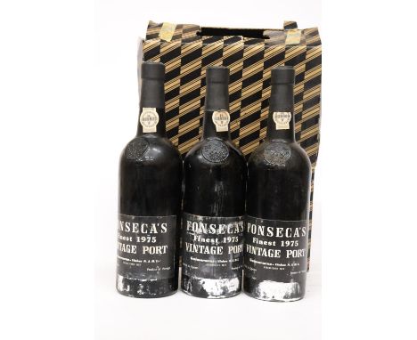 THREE BOTTLES OF FONSECAS 1975 VINTAGE PORT IN A BOX 