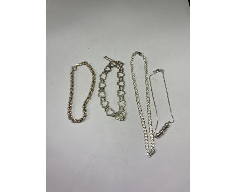 FOUR SILVER BRACELETS 