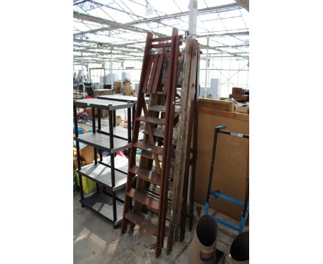 A VINTAGE WOODEN SIX RUNG STEP LADDER AND A VINTAGE WOODEN 5 RUNG STEP LADDER 