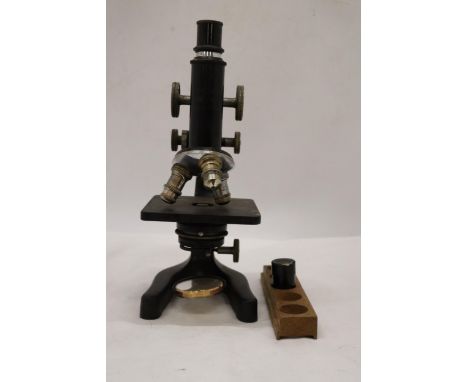 AN ERNST LEITZ WETZLAR MICROSCOPE, NO. 324603, WITH WOOD TRAY AND SPARE LENS 