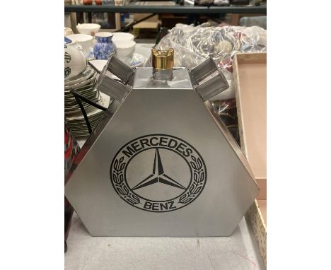 A SILVER MERCEDES OIL CAN 