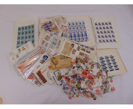A quantity of GB and foreign stamps to include sheets, first day covers and loose stamps