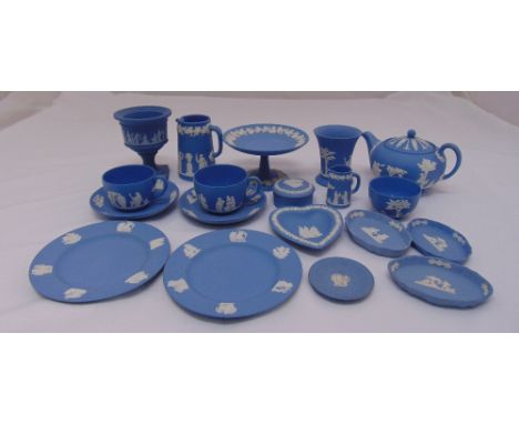 A quantity of Wedgwood blue Jasperware to include teapot, cups, saucers, plates and dishes (14)