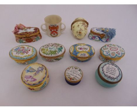 A quantity of porcelain and enamel Halcyon days pill and patch boxes, a Goss style loving cup and two Limoges boxes (11)