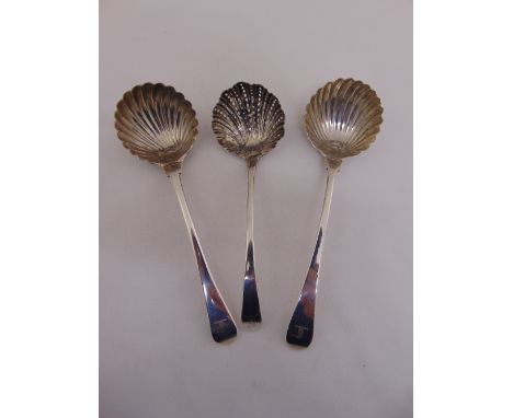 A pair of George III silver hallmarked sauce ladles Old English pattern with scalloped bowls, Isaac Callard London circa 1770