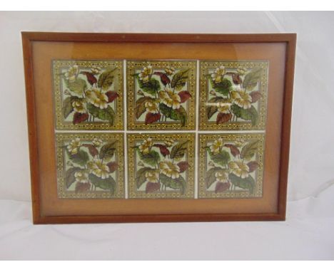 A framed and glazed display of six matching Victorian ceramic tiles, 56.5 x 41cm