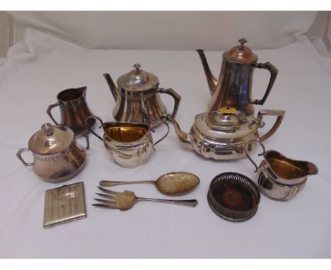 A quantity of silver plate to include a four piece WMF tea service, a three piece silver plated tea set, a serving spoon and 