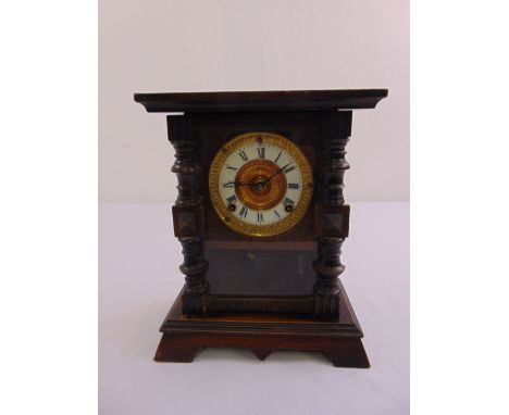 A mahogany and glass mantle clock with gilded metal dial, two train movement to include pendulum