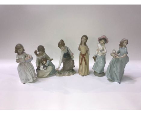 Five Lladro figures and one Nao figure of a girl holding a Dove (6)