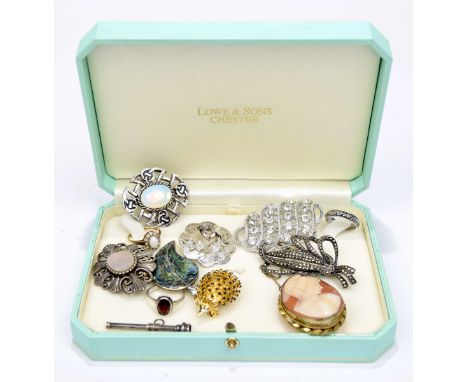 A selection of costume jewelleryTo include a 9ct gold opal and cubic zirconia cluster ring, together with eight brooches and 