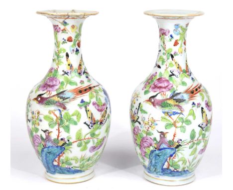 A pair of Chinese famille rose vases, late 19th Century Each of baluster from, the milky white ground, detailed in pink, gree