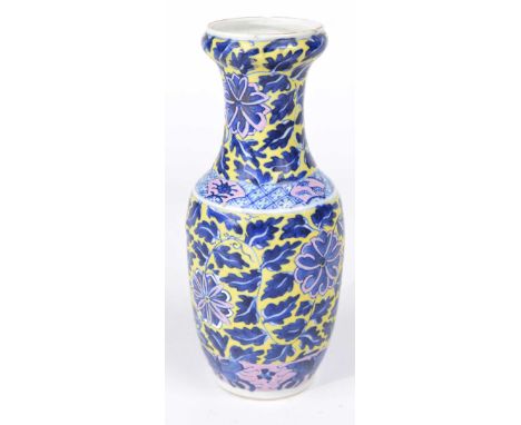 A Chinese vase, Kangxi four-character mark, 19th / 20th CenturyOf baluster form, extending to an open dish mouth, the yellow 