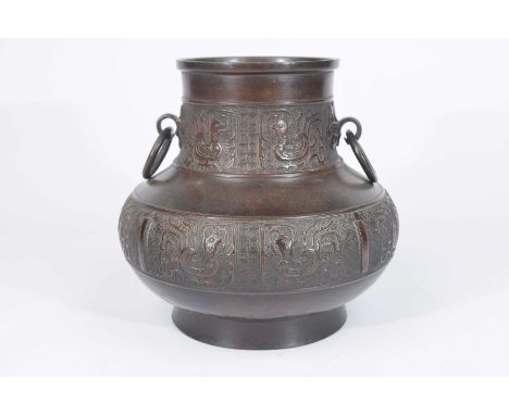 A Chinese ritual wine vessel (Bo You Fu Ling), circa 1900Of rounded baluster form, extending to a cylindrical vase, the exter