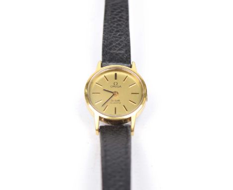 A ladies Omega De Ville quartz wristwatchThe circular shape gold dial with similar colour baton hour markers and black enamel