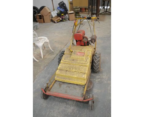 A vintage Hayter Condor petrol rotary lawnmowerWith five gears and twin disc cutters.