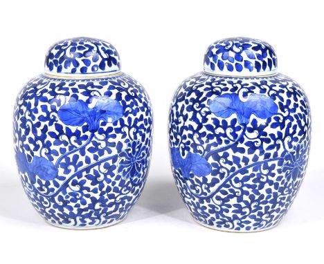 A matched pair of Chinese blue and white jar and covers, Kangxi marks to base Each of oviform, surmounted by a domed cover, t