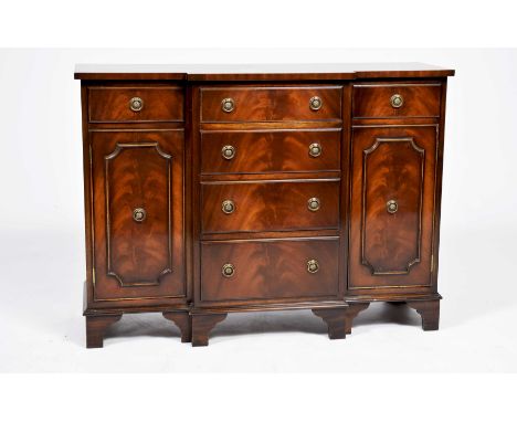 A Reprodux by Bevan Funnell mahogany breakfront sideboardOf small proportions, having an arrangement of six drawers and two c