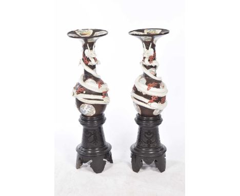 An impressive pair of Chinese Famille noire vases, late Qing (1644-1912) DynastyEach of the wide dish mouth extending to a sp