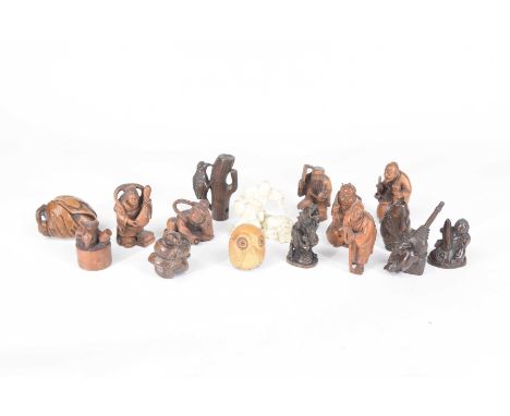 A collection of various Japanese netsuke, 20th CenturyIncluding seven various figural examples depicting immortal Gods, Sumo 