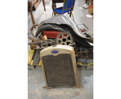 A quantity of mainly Clyno sparesFrom various models including front and back axles, steering column, radiator and surround, 