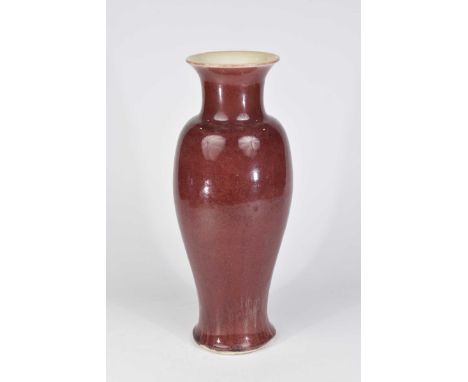 A Chinese Sang-de-boeuf glazed vase, 20th Century Of baluster form, the heavily potted body with rich allover streaked red gl