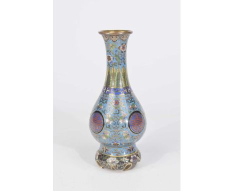 A Chinese cloisonne vase, late Qing Dynasty (1644-1912) Of bottle form extending to a splayed upper rim, mounted on a scallop