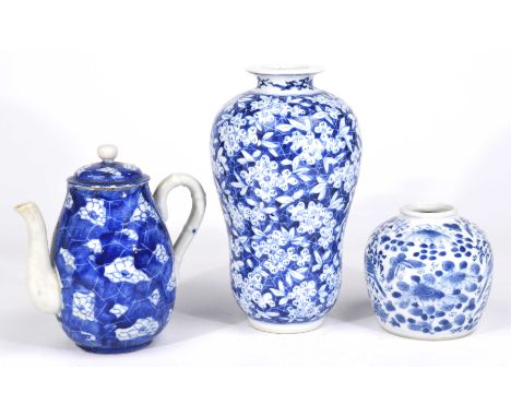 A collection of Chinese blue and white ceramics, 20th CenturyTo include a prunus teapot, 16cm high; a small Kangxi style lotu