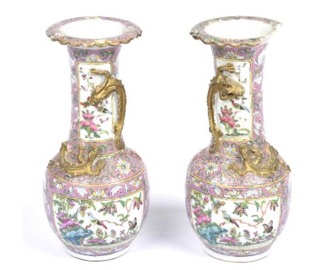 A pair of Chinese Famille rose vases, 19th/20th CenturyEach of bottle form extending to an everted scalloped rim, the neck mo