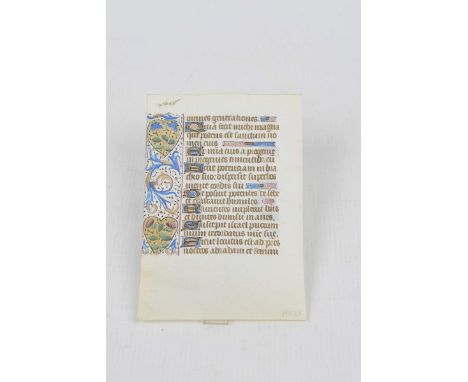 A Medieval illuminated manuscript page, probably 14th/15th CenturyWith gilded and hand coloured initials and decoration. 14.5