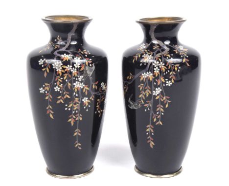 A pair of Japanese cloisonne vases, early 20th CenturyEach of tapered ovoid form extending to a flared rim, the dark blue sol