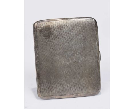 A 1930s silver cigarette caseOf rectangular outline, the engine turned case opening to reveal a silver gilt interior. Birming