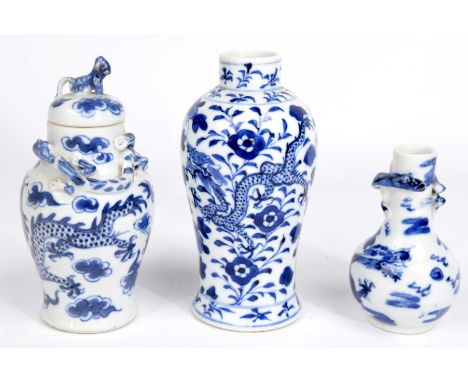 A collection of three Chinese blue and white vases, 19th / 20th CenturyTo include a baluster form vase, detailed with lotus a