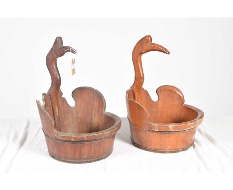 Two South East Asian swan head bowls/planters Each of the wooden constructed circular bowls extending to a swan head finial, 