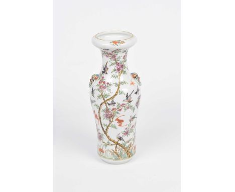 A Chinese 19th Century famille rose vase Of shouldered form, extending to a wide dish mouth, applied to the body with relief 