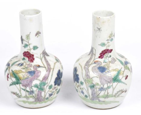 A pair of Chinese famille rose vases, Jiajing six character mark (1522-1560) 19th Century Each of bottle form, the body with 