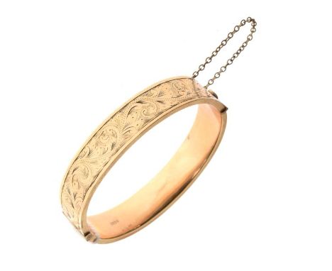 9ct gold snap bangle engraved foliate decoration, 18.4g approx   Condition: 